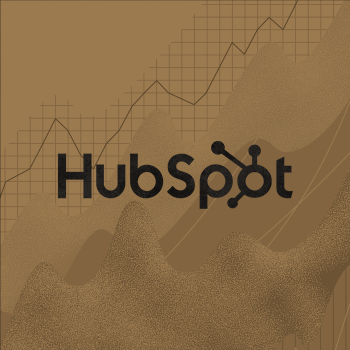 HubSpot logo over an upward trending data chart