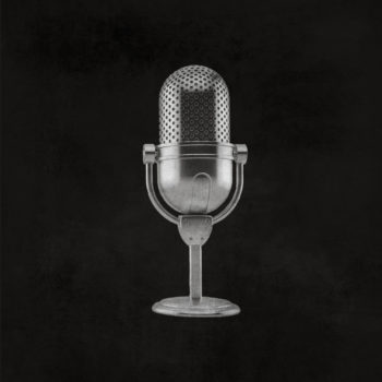 Microphone on top of charcoal background
