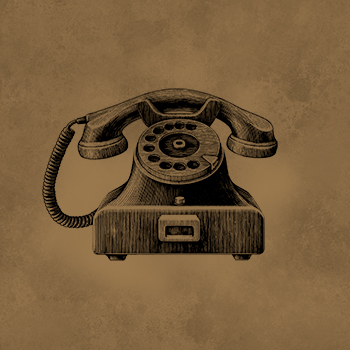 Rotary telephone on top of gold background